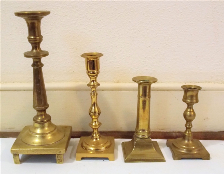 4 Brass Candlesticks including 5 1/2" Push Up and Early Heavy Brass 10" With Repaired Foot