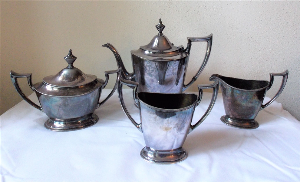 Derby Silver Plate Co. Tea Set including Tea Pot, Cream, Sugar, and Waste Bowl - Tea Pot Measures 9 1/2" Tall 11" Spout to Handle