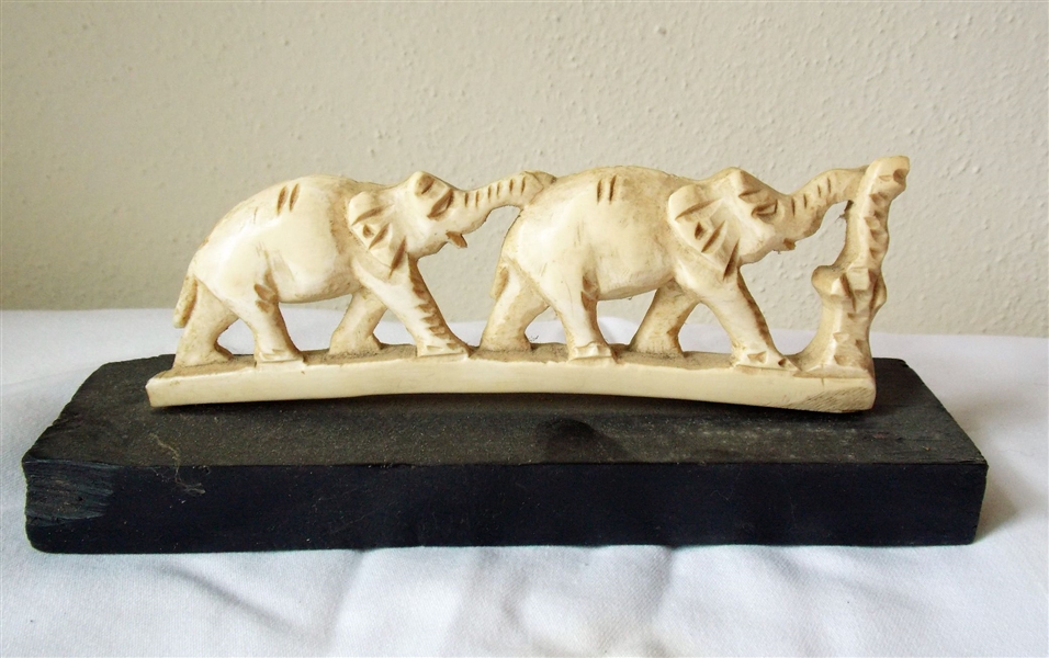 Carved Bone Elephants on Wood Stand - Elephants Measure 6 1/4" Long 2 1/4" Tall with Stand 3 1/4" Tall