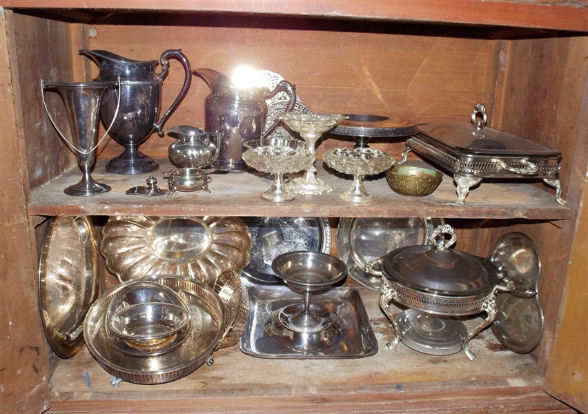 2 Shelves of Silverplate including Compotes, Basket, Chafing Dish, Casserole, Platterss, Bowls, Etc. 