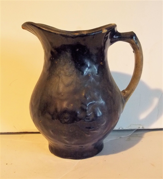 Blue Salt Glaze Pitcher with Flowers - Small Glaze Flake, Chip on Lip and Bottom Edge - Measures 7" tall 6" Across