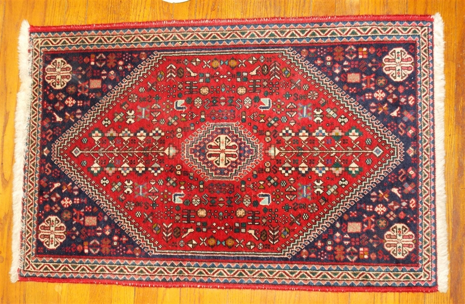 Finely Woven Oriental Rug - Red Background - Measures 40" by 26"