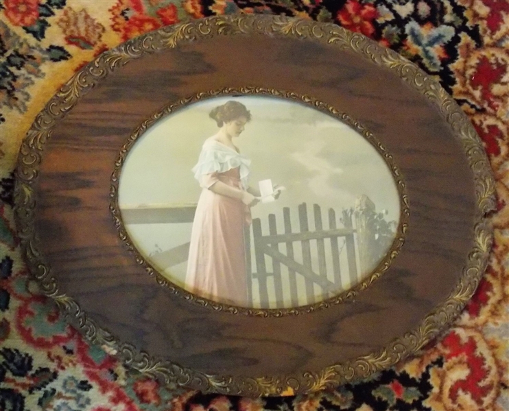 Print of Lady Reading Letter in Oval Frame Small Chip in Side of Frame - Frame Measures 15" by 19" Print Measures 9" by 12"