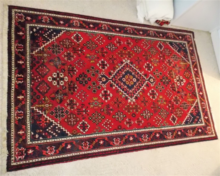 Beautiful Oriental Rug -Red Background with Navy, Light Blue, Cream, Orange, and Brown Details - Measures 7 by 4 5"