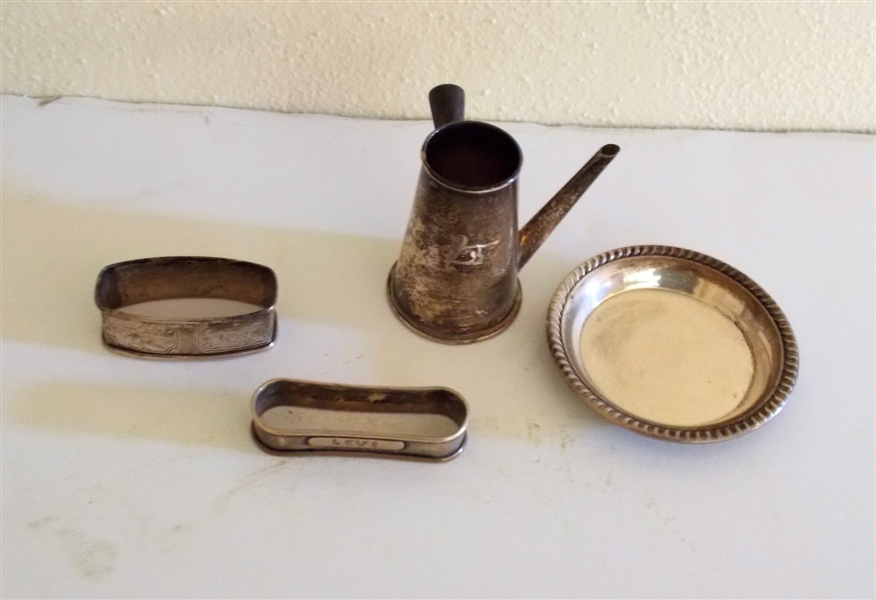 Lot of Sterling Silver including 2 Napkin Rings 1 with "Luke" and Other Engraved Animals, Small Plate, and Miniature Pitcher with Engraved Lion - Pitcher Measures 2 1/2" tall Plate 3 1/4" Across