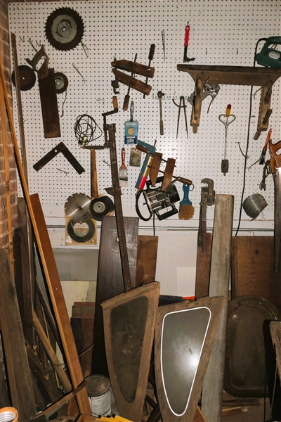 Wall of Tools including Clamps, Boat Windows, Miller Falls Saw, Diston Saw, Router, Wrenches, Wire, Snips, Furniture Parts