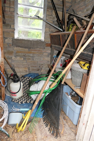 Contents of Potting Shed including Garden Tools, Weed Eater, Chain Saw, Garden Hose, Sprayer,  - No Shelving Included - 