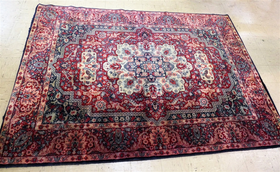 Red and Blue Rug with Medallion in Center - Some Overall Red Bleeding - Measures 79" by 57"