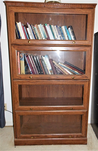 Faux Oak Bookcase with 4 Lift Doors - Measures 61" tall 34" by 13" - NO CONTENTS