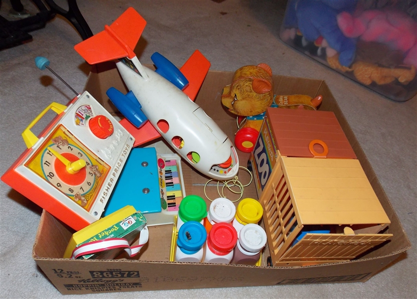 Lot of Playskool and Fisher Price Toys including Cry Baby Bear, Clock, Piano, Pocket Reader
