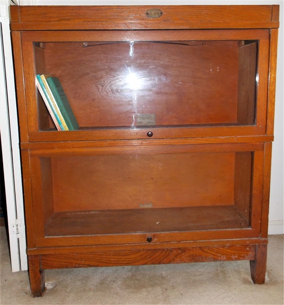 Oak Globe Wernicke Sectional Bookcase - 2 Sections - Measures - 40" tall 34 1/2" by 11 1/2" NO CONTENTS - Small Area of Veneer Loss - See Photo
