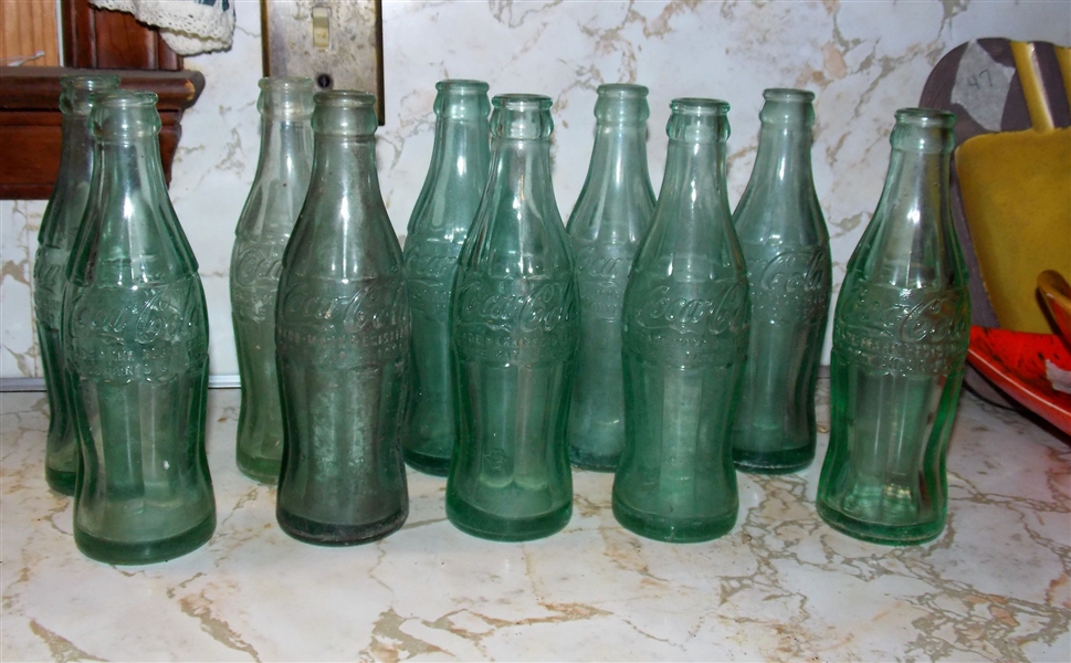 10 Coca Cola Bottles including Deland, Fla., Meadville, PA, Jacksonville, FLA, Ocala, Fla. And Starke, FLA. 