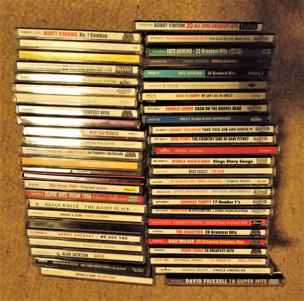 Lot of CDs including Allan Jackson, George Jones, The Drifters, Kenny Chesney, Toby Keith, Brooks & Dunn, Fats Domino, Etc.