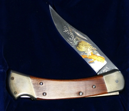 Buck Model 110 Knife with Eagle on Blade in Wood Box