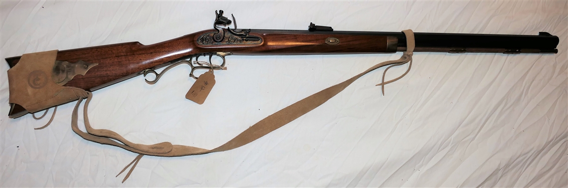 Thompson Center Arms . 45 Caliber Black Powder Long Rifle - Double Trigger with Brass Patch Box and Leather Sling Strap