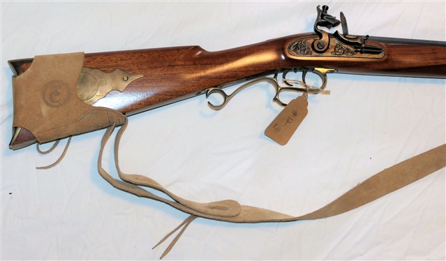 Thompson Center Arms . 45 Caliber Black Powder Long Rifle - Double Trigger with Brass Patch Box and Leather Sling Strap