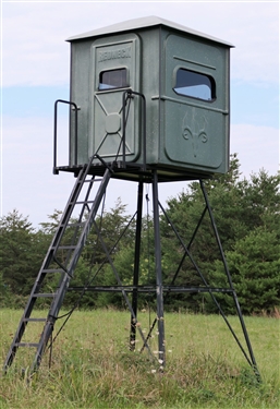 Redneck Fiberglass Hunting Blind on 10' Platform - Windows on all sides open, with Cupholder and Gun Rests - Door Side is 5' Across 6'6 Tall in Center of Interior - Foam Covered Walls and Door 