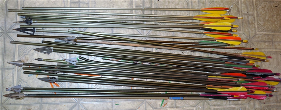 2 Quiver with Arrows including Razor Tips - Black Quiver is by Bear