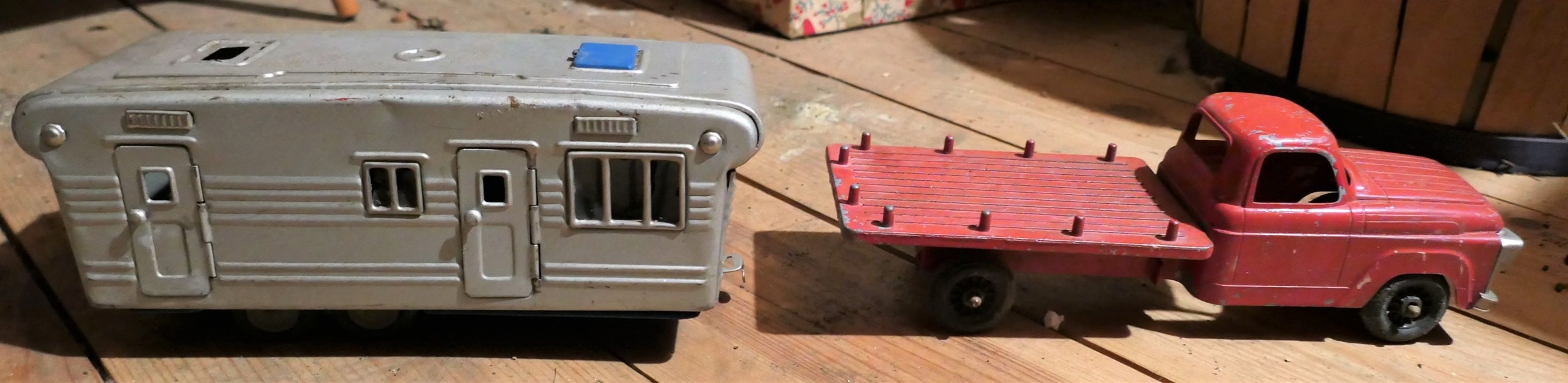 SSS Japan Metal Camper Toy and Red Metal Truck - Camper Measures 3 1/2" tall 8 1/2" by 3 3/4"