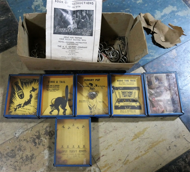Collection of A.C. Gilbert CO. Puzzles and Games with Original Instructions - "Radio Tube Trick" "Ring A Tail" "Atomic Bomb" and Ring Puzzles 