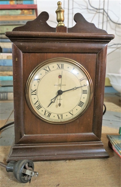 General Electric Strike Clock - Electric Powered -Wood Case - Measures 12" Tall, 7 1/2" by 4 1/2"