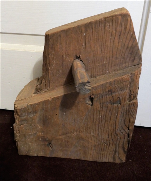 Log with Peg Used As Door Stop 