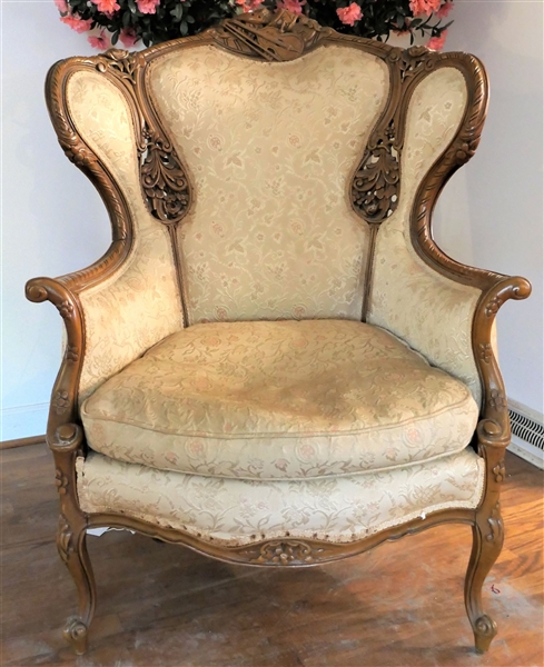 Beautiful Ornate Carved Wing Back Chair with Violin and Floral Carvings - Measures 46 1/2" tall 33" by 25"