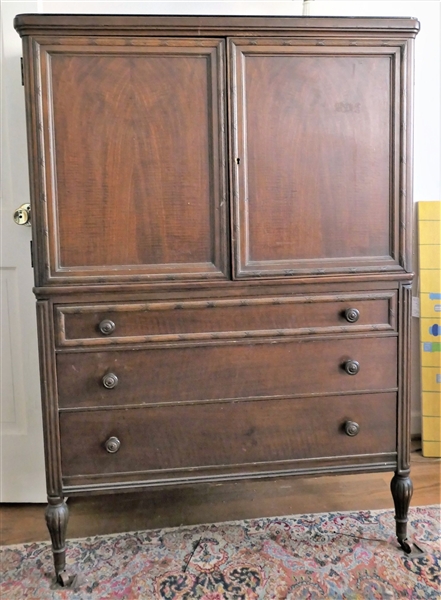 Mahogany Gentlemans Chest with 4 Drawers Behind Cabinet Doors and 3 Drawers on Bottom - Measures 54" tall 38" by 24" - Has Glass Top 