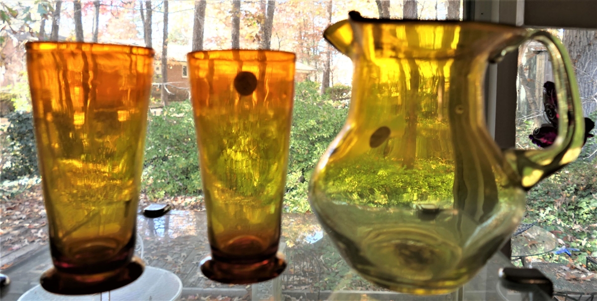 Hand Blown Yellow Glass Pitcher and 2 Red to Yellow Blown Glass Footed Glasses - Glasses Measure 5 3/4" Tall 