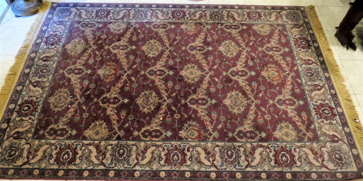 Burgundy and Tan Machine Made Rug Measures 79" by 54"