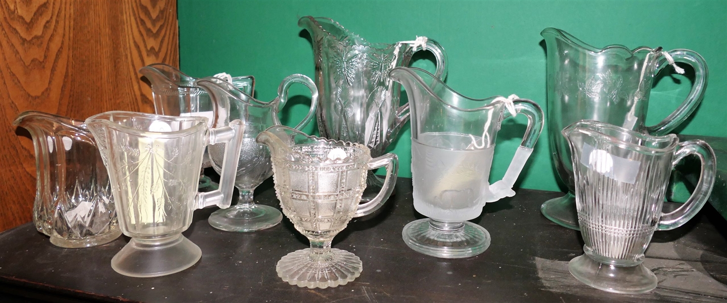 Lot of Early American Press Glass Pitchers including Running Deer, Gold Trim, Drape, and More 