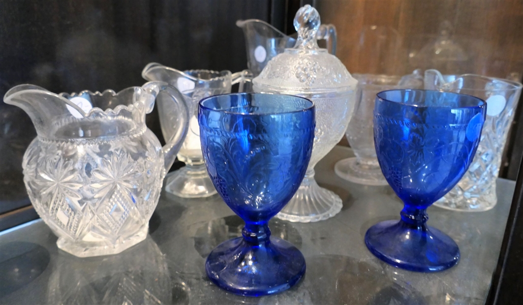 Lot of Early American Press Glass including Blue Glasses, Grape Candy Jar, Pitcher, Baltimore Pear Creamer, and Flowers, 