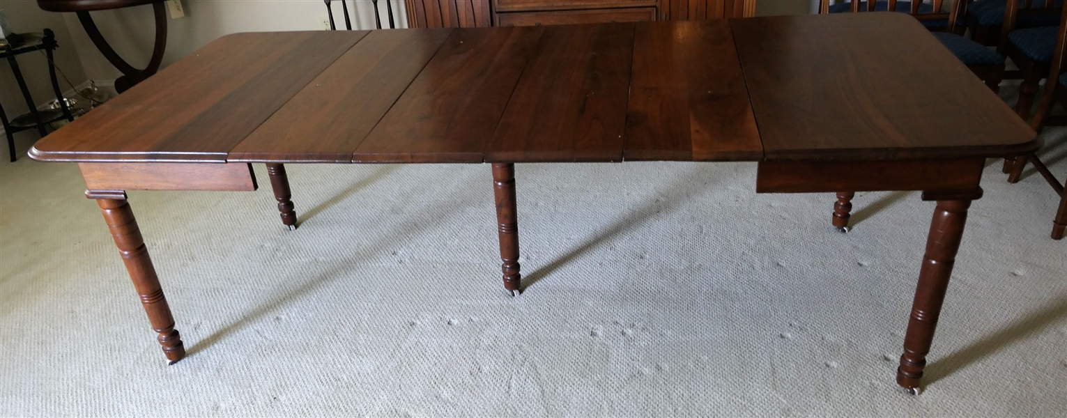 Walnut Turned Leg Dining Table with 4 Leaves - 5 Legs  -Closed Measures 29" tall 44" by 44" Each Leaf Measures 11 1/2"