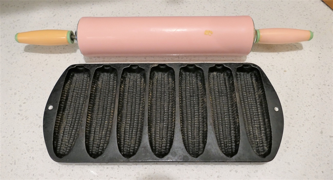 Cast Iron Corn Stick Pan and Pink Plastic Rolling Pin