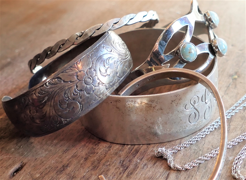6 Pieces of Sterling Silver including Engraved Cuff Bracelet, Monogrammed Cuff Bracelet, Narrow Cuff "Shahdaroba", Cuff Missing 1 Stone, and Sterling Silver Necklace with Amethyst Pendant