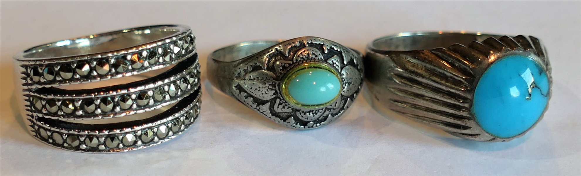 3 Sterling Silver Rings - Turquoise Cabochon Ring Size 8 1/2, Sterling Silver Marcasite Size 7, and Sterling Silver with Small Blue Stone Size 7