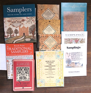Lot of Books on Samplers including Samplers Hardcover Book, Traditional Samplers Samplings Booklets, The Scarlet Letter and The Sampler Engagement Calendar 