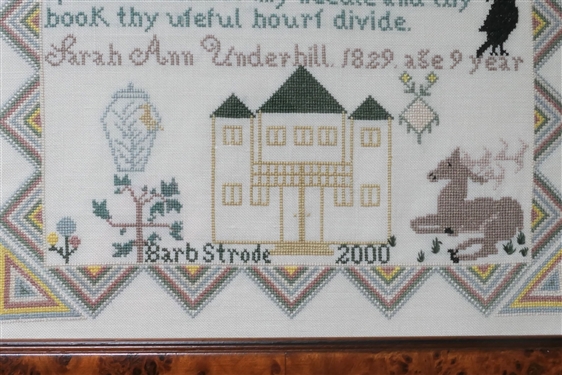 Barb Strode 2000 Hand Stitched Needlework Sampler with Deer and Bird - Nicely Framed - Frame Measures 16 1/2 by 16 1/2