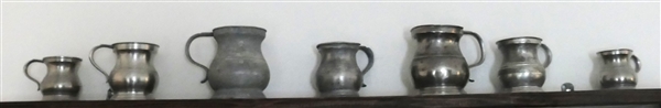 7 Small Pewter Pitchers - Largest Measures 4" tall 