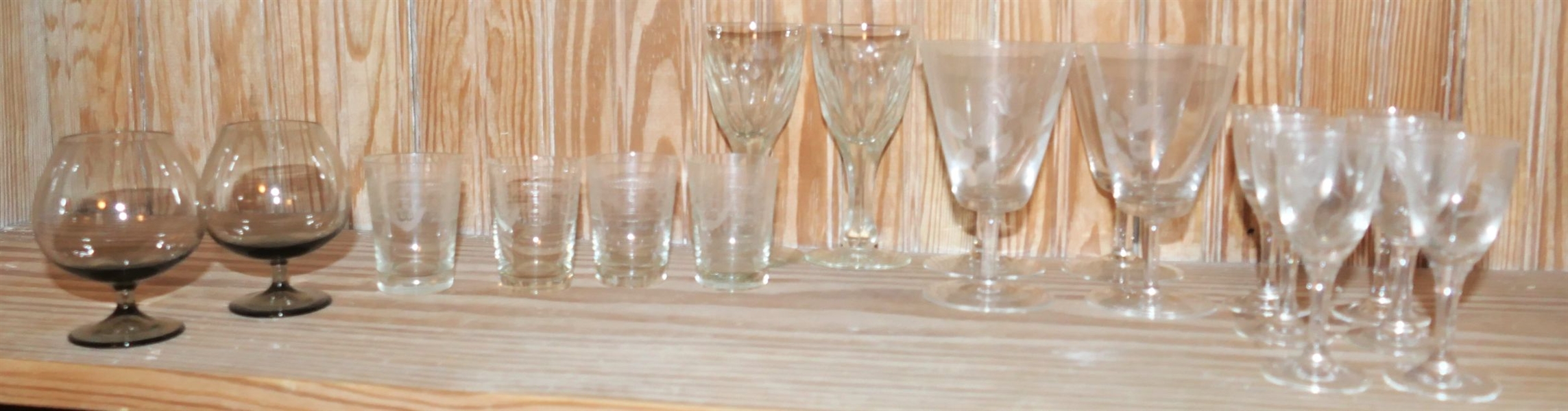 Mixed Lot of 18 Pieces of Glassware Including Etched Shot Glasses, Amber Cordials, and Others
