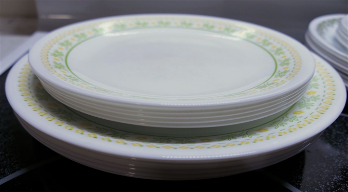 29 Pieces of Corelle China - Green Daisy Pattern and Green and Yellow Flowers - Green and Yellow Plates are Worn Scratched