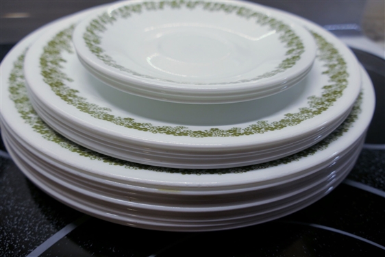 29 Pieces of Corelle China - Green Daisy Pattern and Green and Yellow Flowers - Green and Yellow Plates are Worn Scratched