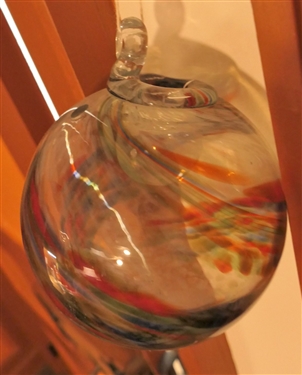 Red, Black, and Green Swirl Hand Blown Witch Ball - Measures 4 Across