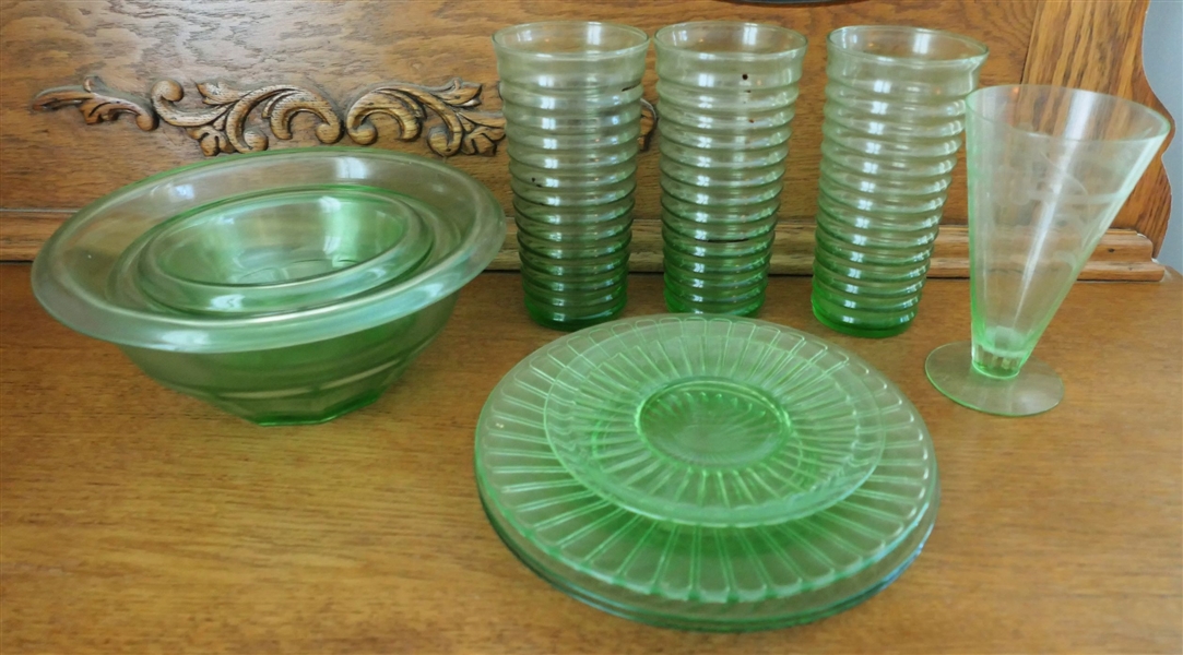 11 Pieces of Green Depression Glass  including Nesting Mixing Bowls, Ribbed Glasses, Plates, and Etched Glass - Ribbed Glasses Measure 6 3/4" Tall 