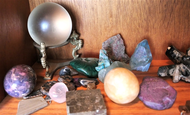 Lot of Stone and Geodes including stone Eggs, Crystal Ball on Stand, Jar of Stones, and Horn Carved Piece
