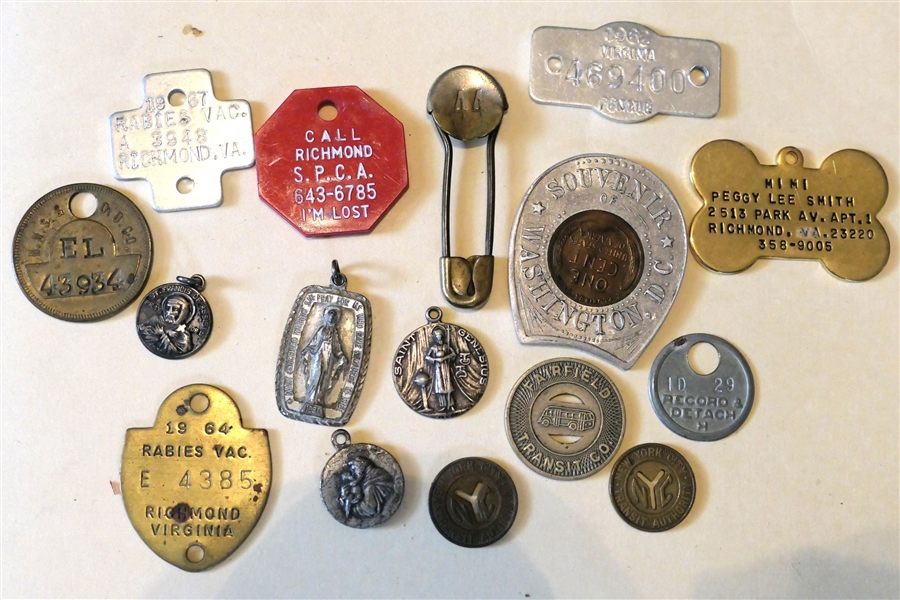 Collection of Coins, Tokens, and Pendants including Lucky Wheat Penny, Bus Tokens, New York Transit Token, 3 Sterling Silver Saint Pendants, Dog Collar Tag, 