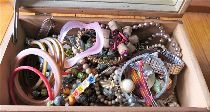 Lot of Costume Jewelry in Wood Box with Mirrored Lid - Box Measures 4 tall 11 by 6 - Jewelry Includes Beaded Necklaces, Faux Pearls, Bangle Bracelets, and Watches