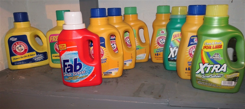 10 Brand New Bottles of Laundry Detergent - Arm & Hammer, Extra, and Fab