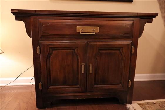 Davis Furniture Asian Style Oak Bar with Fold Out Top - Dovetailed Drawer - Double Cabinet on Bottom - Brass Hardware - Measures 30 3/4" Tall 42" by 18" - Each Fold Out Measures 14 1/2"