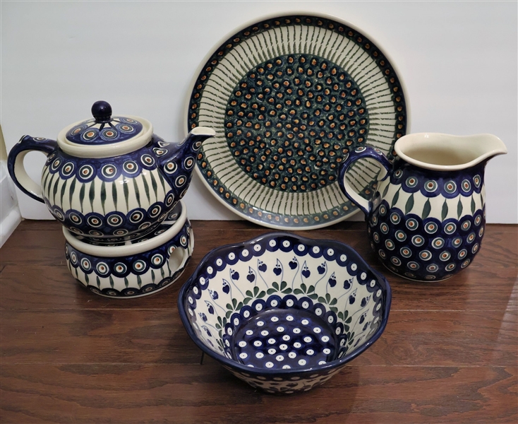 5 Pieces of Handmade Polish Pottery including Tea Pot with Warmer, 7" Pitcher, 12" Platter, and 8" Bowl 